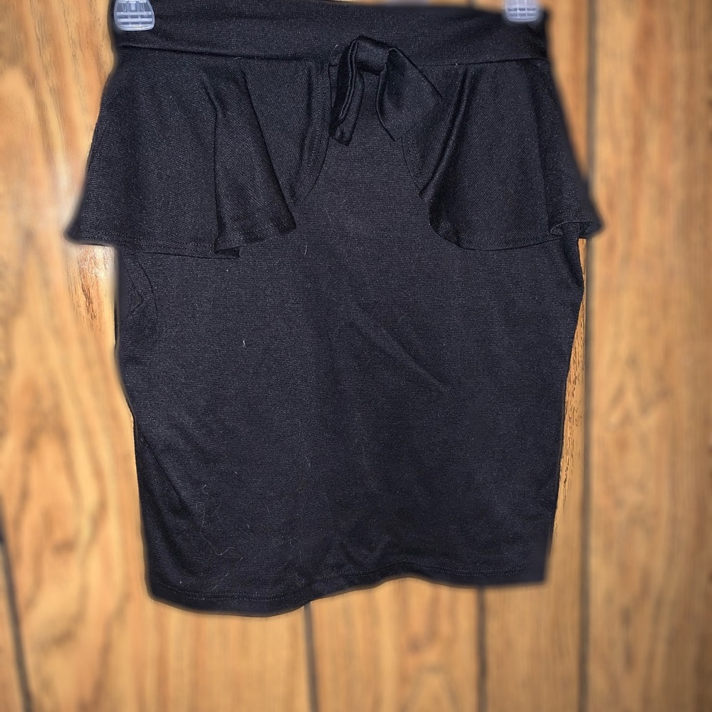 Black mini skirt with a bow